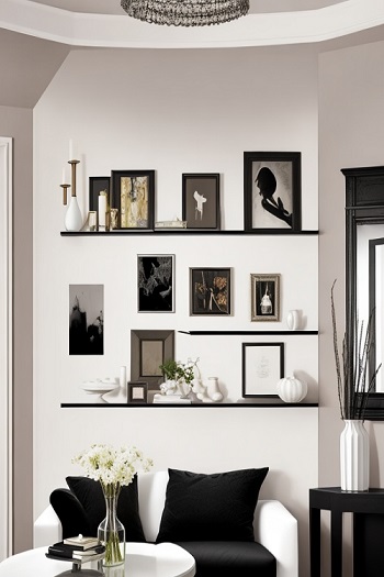 Floating black shelves to display white vases and decor items in an artfu